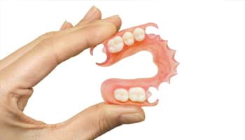 Holding Flexible partial denture